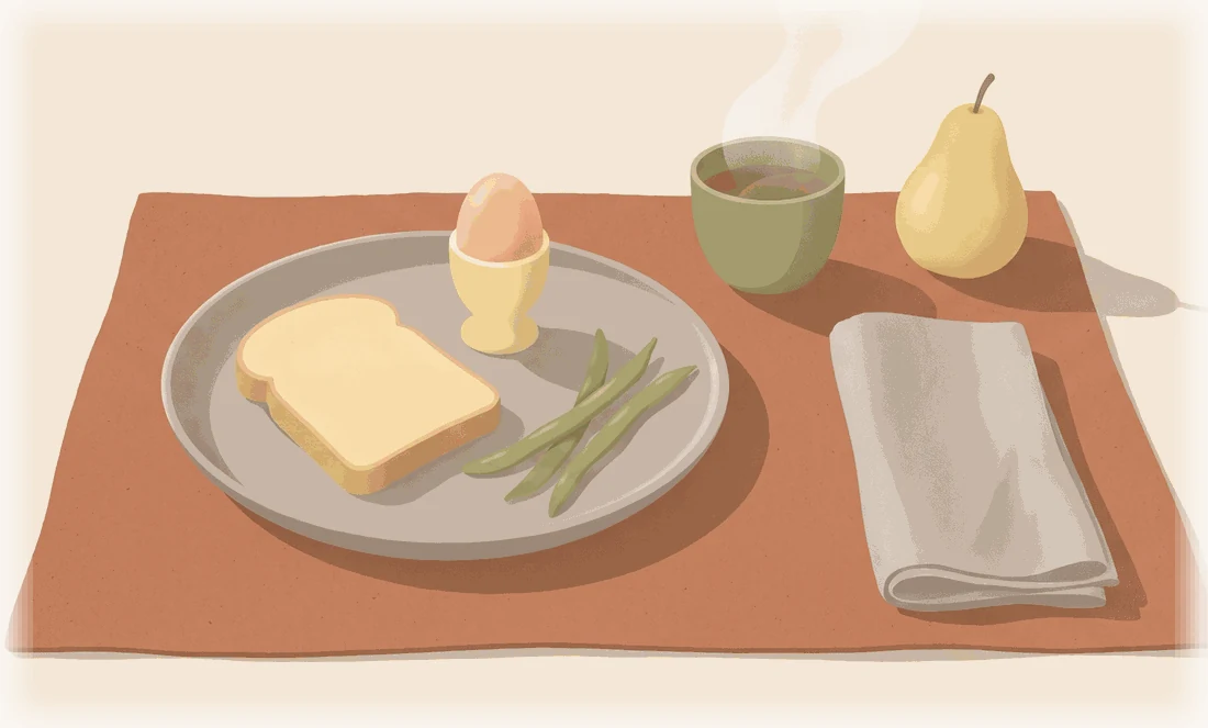 An illustrated breakfast on a terracotta placemat: toast, a soft-boiled egg, green beans, a cup of tea and a pear.